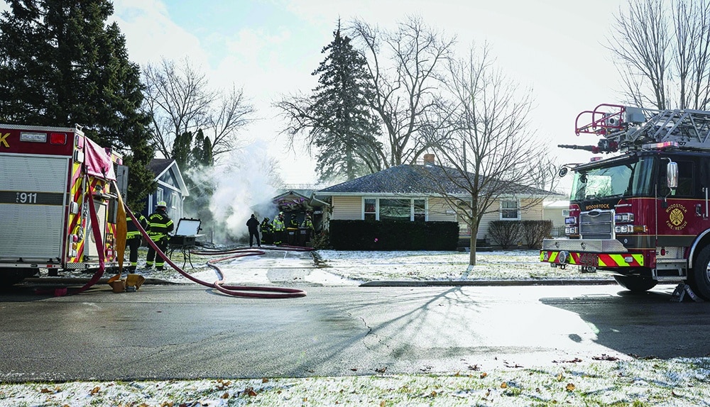 Photo courtesy of the Woodstock Fire/Rescue District.
Firemen last week put out a smoky fire in a garage in the 1300 block of Clay Street that threatened two nearby homes. Damage to the garage and contents was estimated at $200,000.